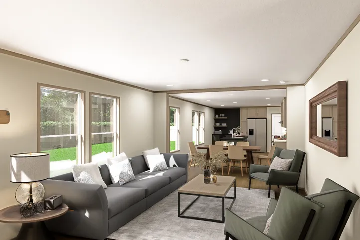 The RAINIER Living Room. This Manufactured Mobile Home features 4 bedrooms and 3 baths.