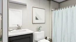 The LEGEND 28X56 3 BR Guest Bathroom. This Manufactured Mobile Home features 3 bedrooms and 2 baths.