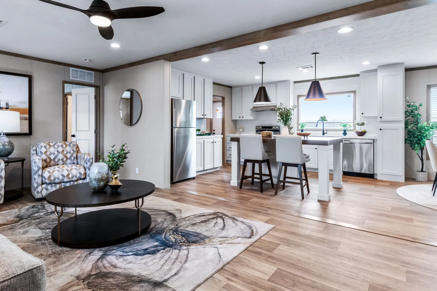 The THE CHOICE Living Room. This Manufactured Mobile Home features 4 bedrooms and 2 baths.