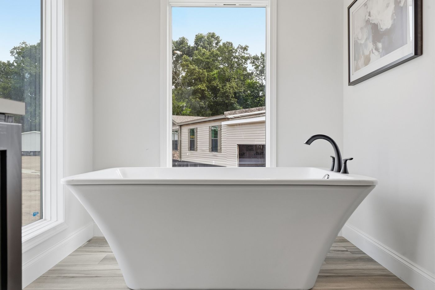 The THE SUMMIT Primary Bathroom. This Manufactured Mobile Home features 3 bedrooms and 2 baths.