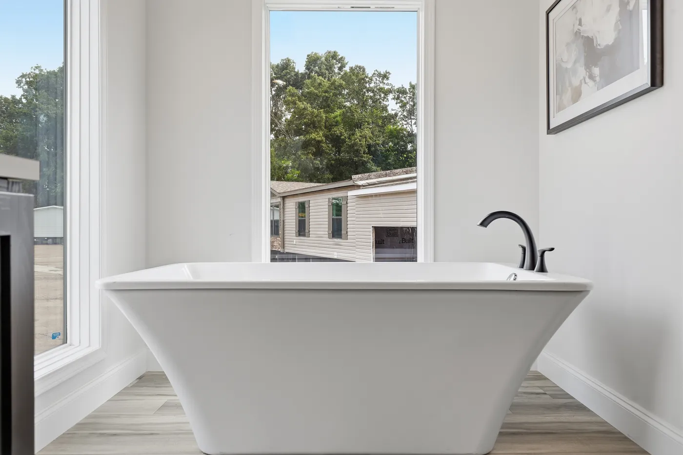 The THE SUMMIT Primary Bathroom. This Manufactured Mobile Home features 3 bedrooms and 2 baths.