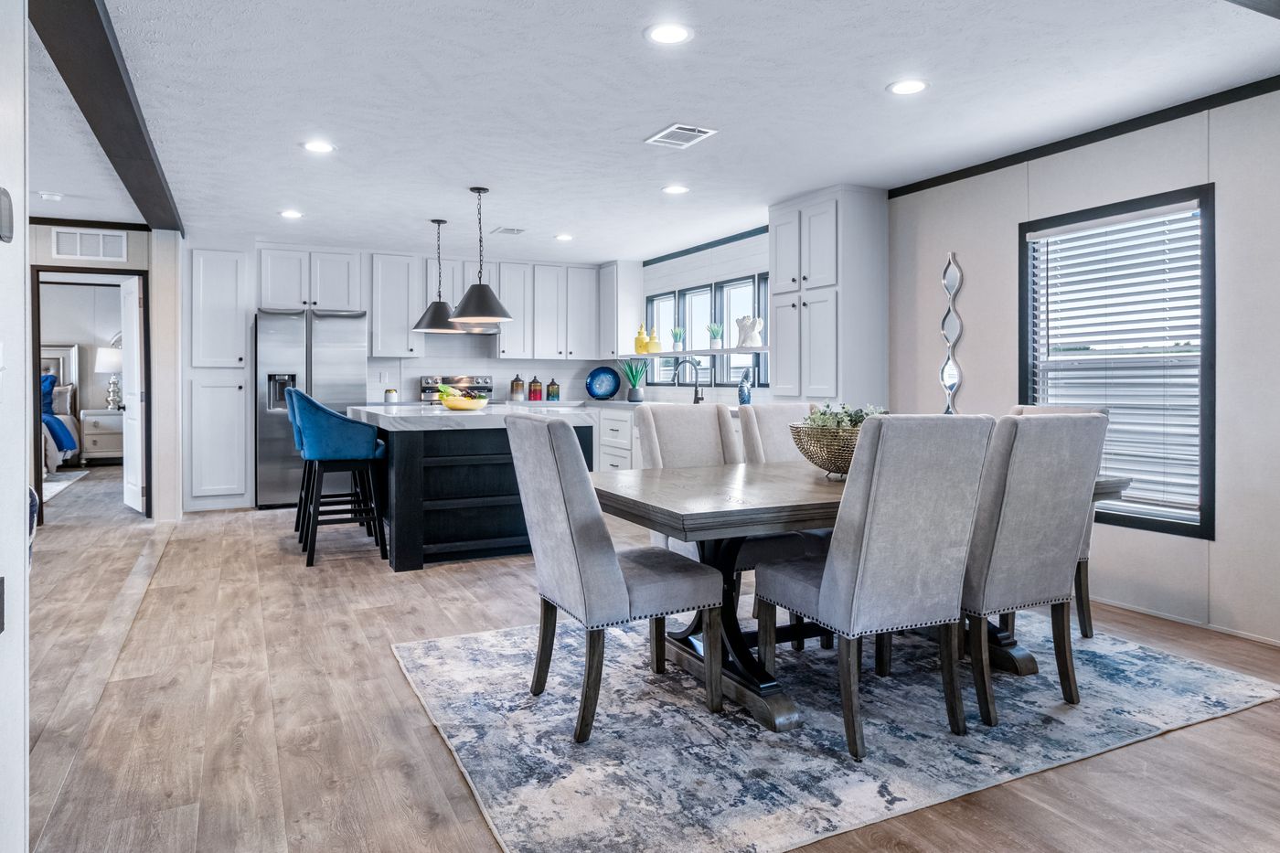 The HERCULES Dining Area. This Manufactured Mobile Home features 4 bedrooms and 2 baths.