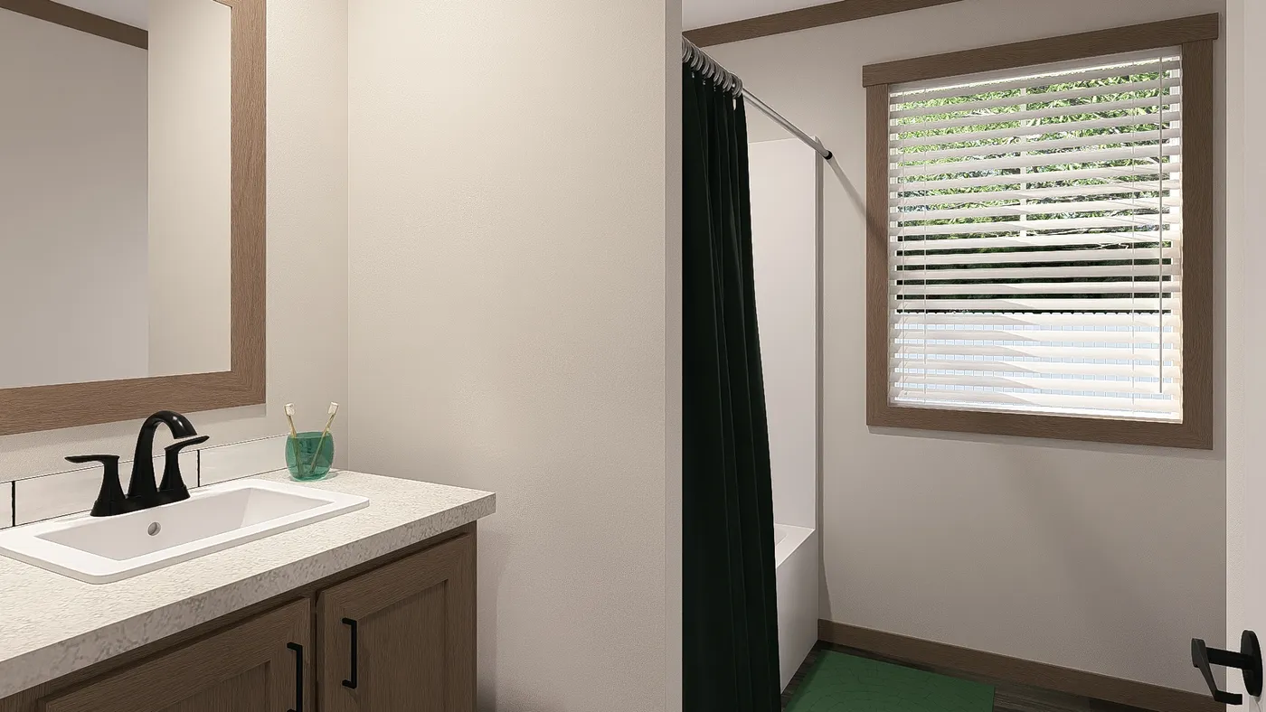 The WILDER Guest Bathroom. This Manufactured Mobile Home features 3 bedrooms and 2 baths.