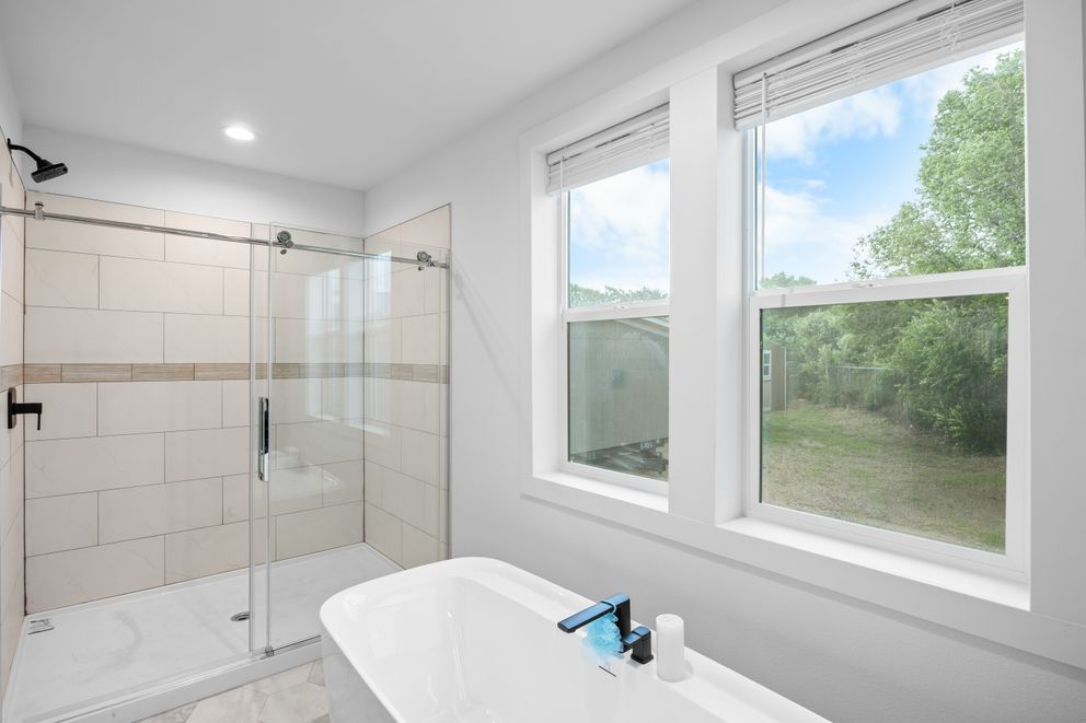 The LULAMAE 3 Primary Bathroom. This Manufactured Mobile Home features 3 bedrooms and 2 baths.