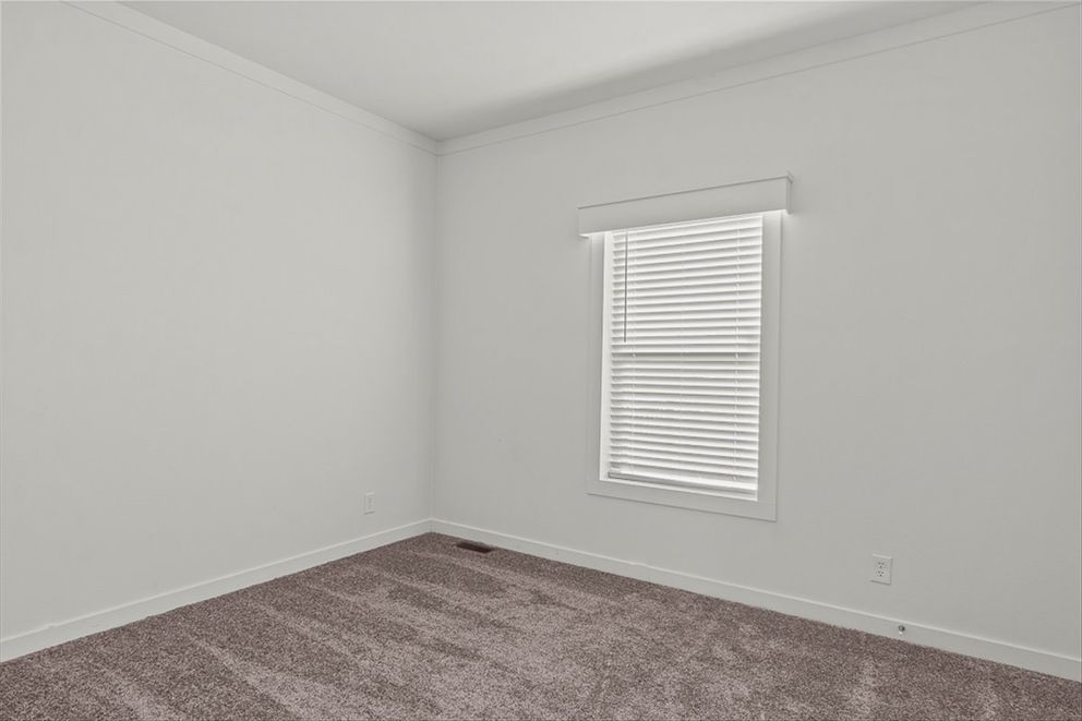 The TU3068A Guest Bedroom. This Manufactured Mobile Home features 4 bedrooms and 2 baths.
