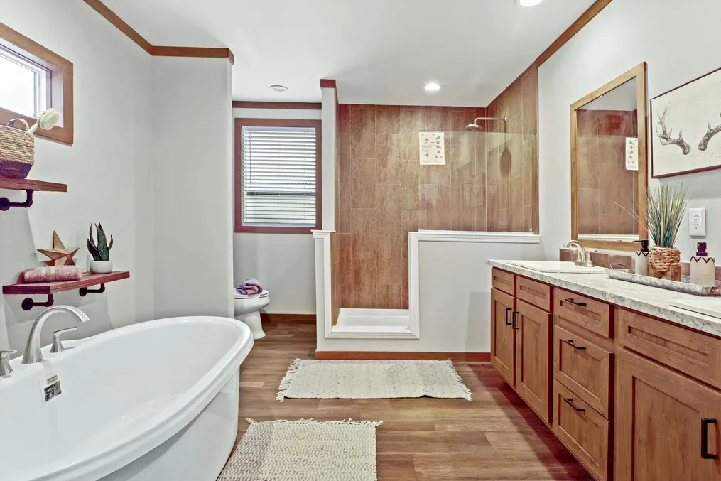 The THE DURANGO Primary Bathroom. This Manufactured Mobile Home features 3 bedrooms and 2 baths.