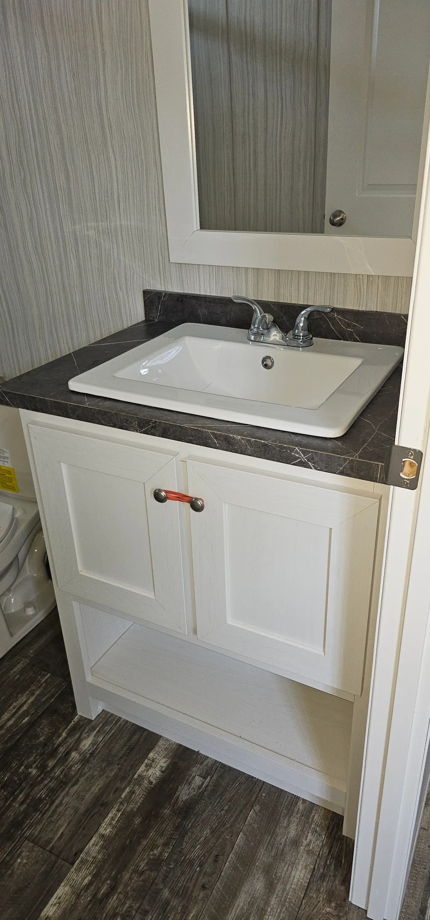 The ONYX 48 Primary Bathroom. This Manufactured Mobile Home features 2 bedrooms and 1 bath.