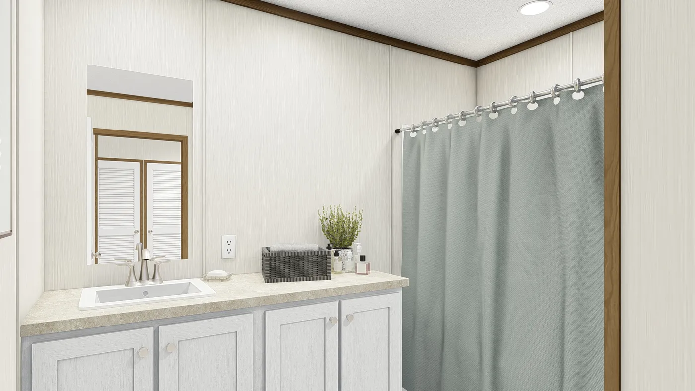 The IMPACT Guest Bathroom. This Manufactured Mobile Home features 4 bedrooms and 2 baths.