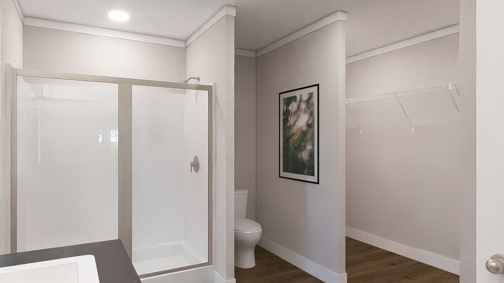 The LET IT BE Primary Bathroom. This Modular Home features 3 bedrooms and 2 baths.