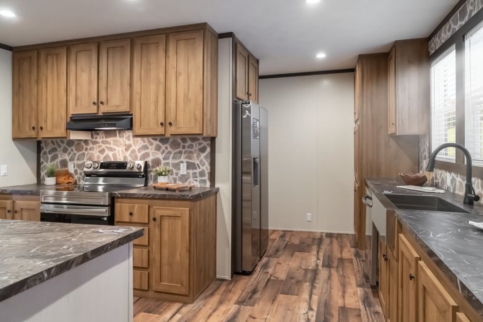 The MOUNTAIN VIEW Kitchen. This Manufactured Mobile Home features 3 bedrooms and 2 baths.