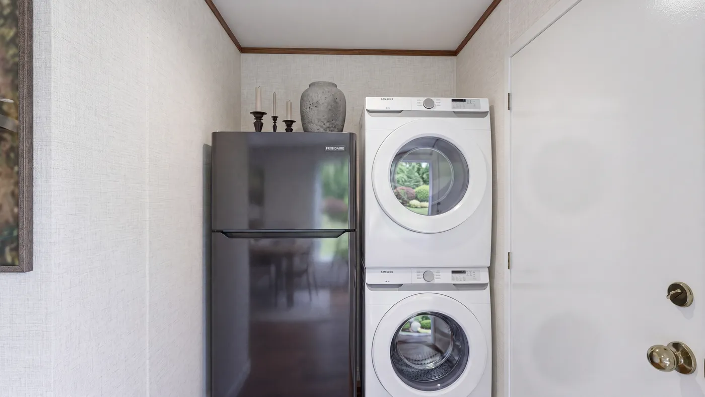 The BUTTERCUP Utility Room. This Manufactured Mobile Home features 1 bedroom and 1 bath.