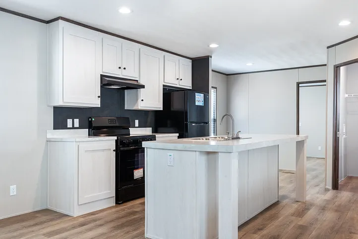 The SELECT 16723B Kitchen. This Manufactured Mobile Home features 3 bedrooms and 2 baths.