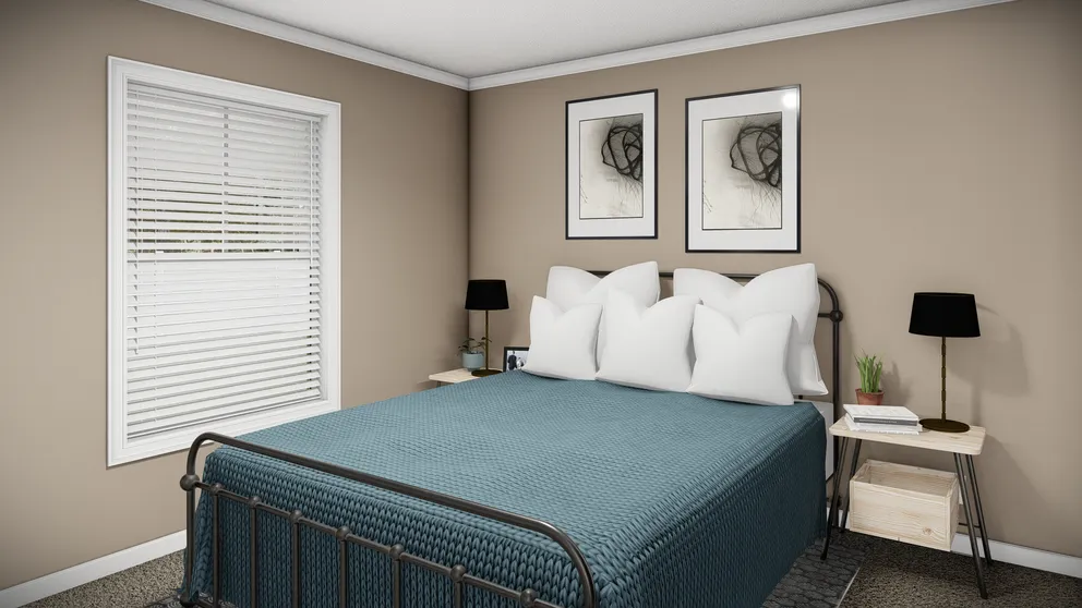 The THE MAVERICK Bedroom. This Manufactured Mobile Home features 3 bedrooms and 2 baths.