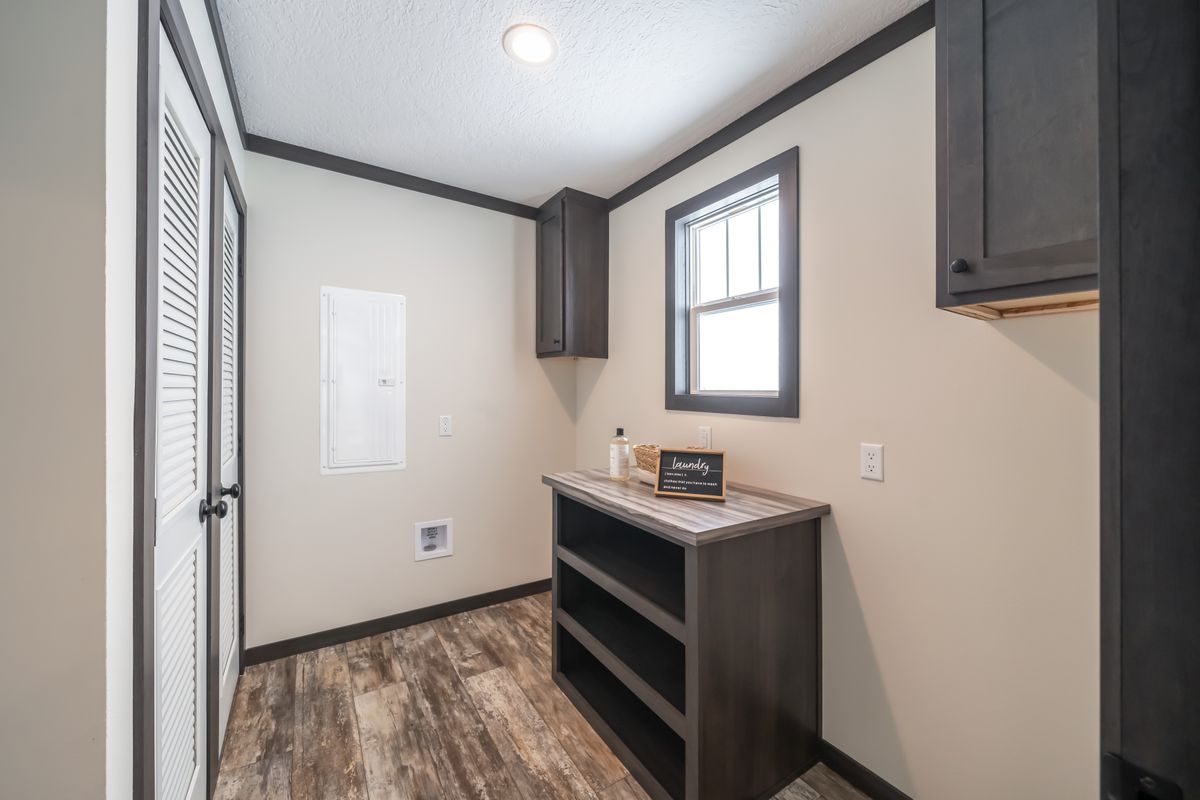 The BOUJEE 56 Utility Room. This Manufactured Mobile Home features 3 bedrooms and 2 baths.