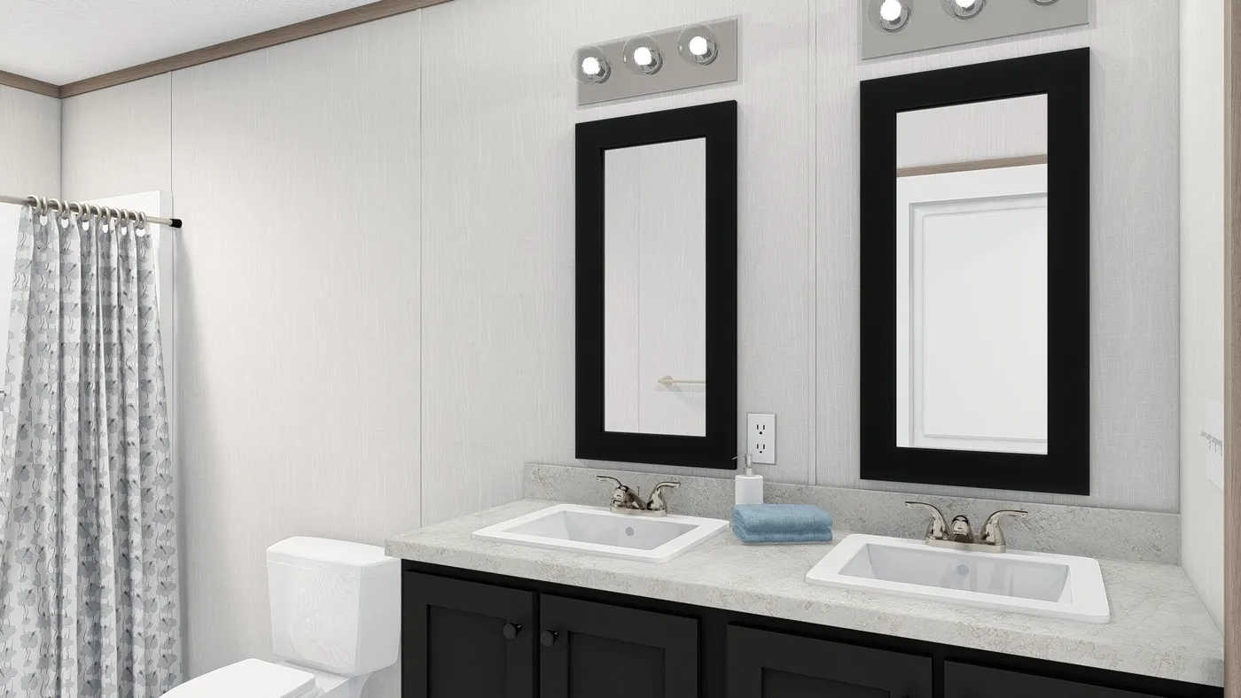 The 4428-E781 THE PULSE Primary Bathroom. This Manufactured Mobile Home features 3 bedrooms and 2 baths.