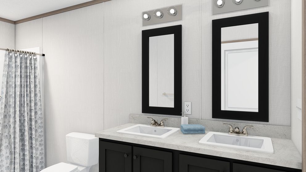 The 4428-E781 THE PULSE Primary Bathroom. This Manufactured Mobile Home features 3 bedrooms and 2 baths.