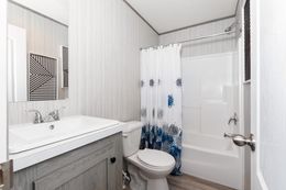 The PLATINUM ANNIVERSARY Guest Bathroom. This Manufactured Mobile Home features 3 bedrooms and 2 baths.