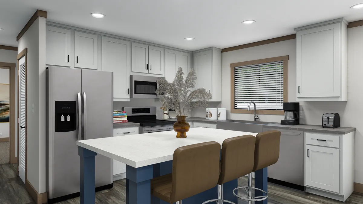 The ANNIE Kitchen. This Manufactured Mobile Home features 3 bedrooms and 2 baths.