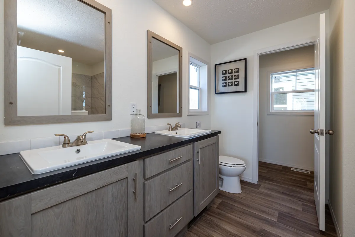 The ROOSEVELT Primary Bathroom. This Manufactured Mobile Home features 3 bedrooms and 2 baths.