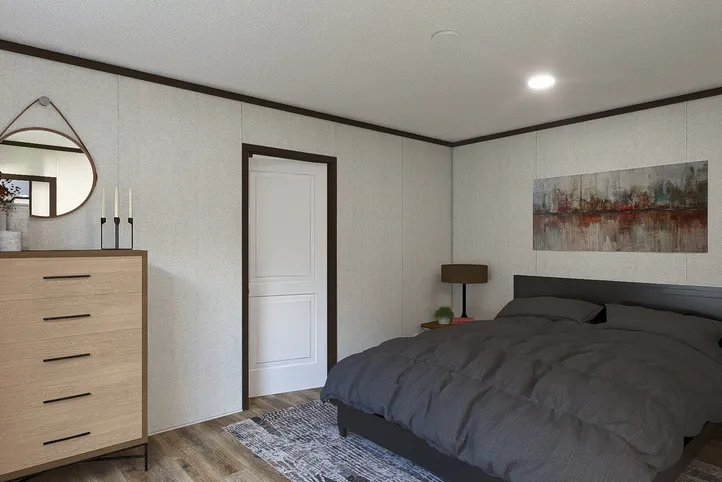 The SPIRIT Primary Bedroom. This Manufactured Mobile Home features 2 bedrooms and 2 baths.