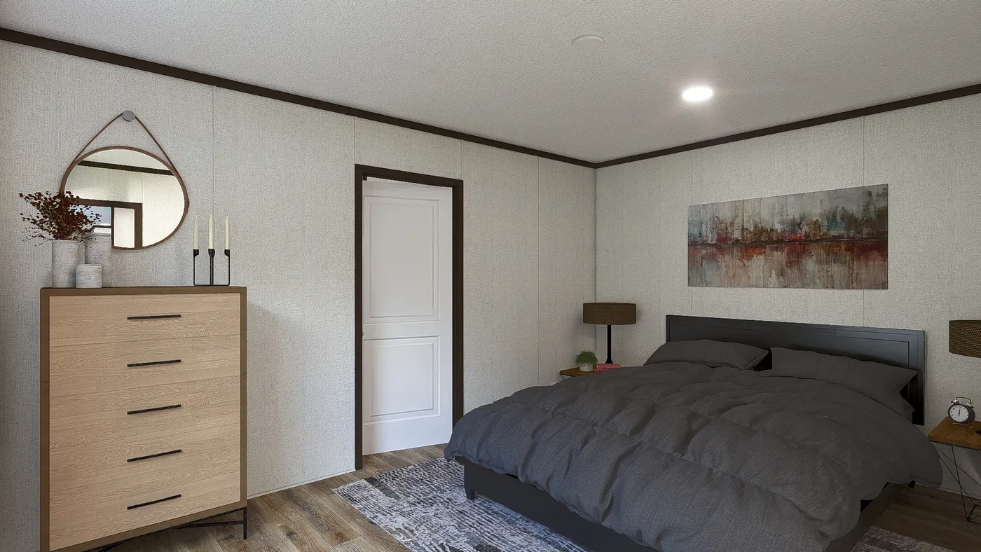 The SPIRIT Primary Bedroom. This Manufactured Mobile Home features 2 bedrooms and 2 baths.