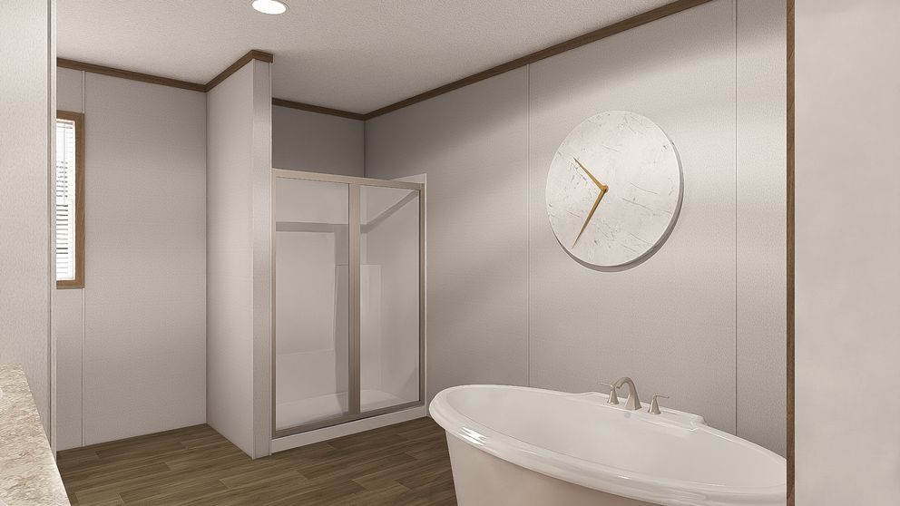 The THE RESERVE 52 Primary Bathroom. This Manufactured Mobile Home features 3 bedrooms and 2 baths.