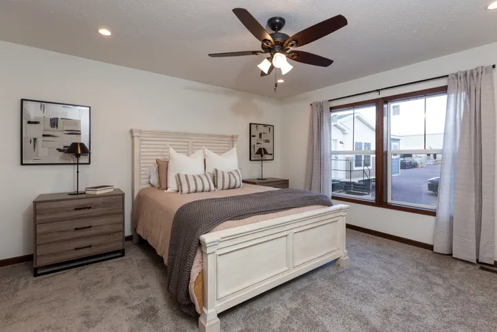 The LEGEND 86 Primary Bedroom. This Manufactured Mobile Home features 3 bedrooms and 2 baths.