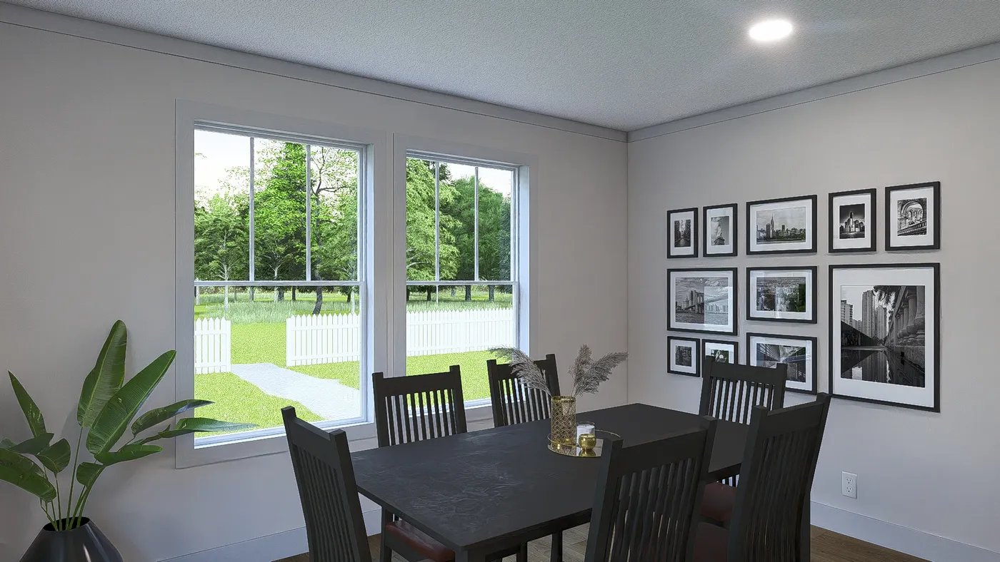 The JOHNNY B GOODE Dining Room. This Modular Home features 3 bedrooms and 2 baths.