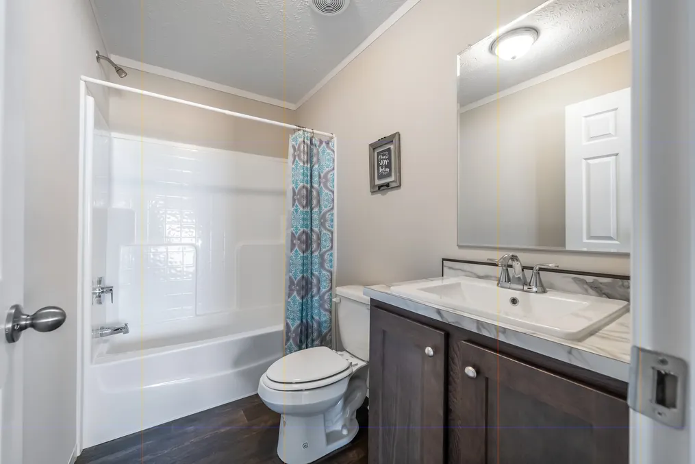 The MAVERICK 56A Guest Bathroom. This Manufactured Mobile Home features 3 bedrooms and 2 baths.