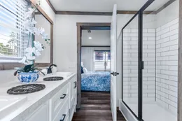 The LIZZIE Primary Bathroom. This Manufactured Mobile Home features 3 bedrooms and 2 baths.