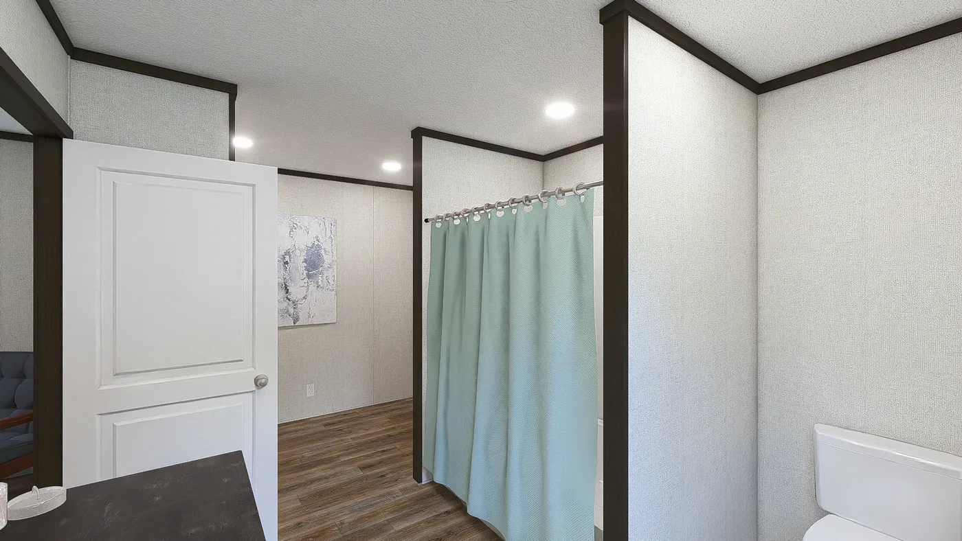 The DYNAMIC Primary Bathroom. This Manufactured Mobile Home features 3 bedrooms and 2 baths.