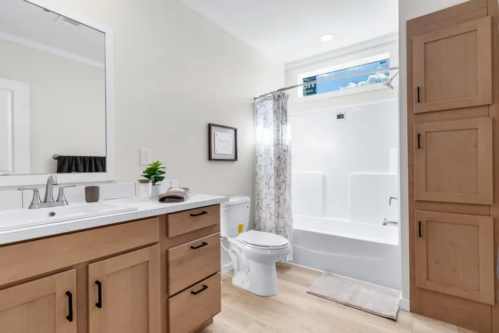 The THE DURANGO Guest Bathroom. This Manufactured Mobile Home features 3 bedrooms and 2 baths.