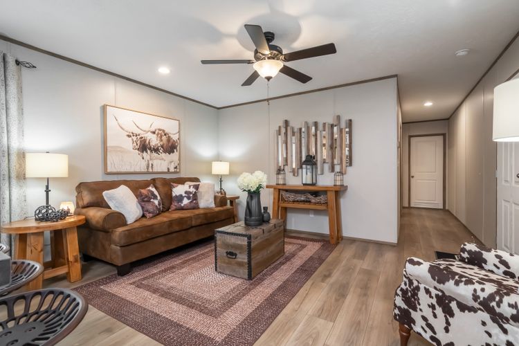 The HORIZON BEACON 16663A Living Room. This Manufactured Mobile Home features 3 bedrooms and 2 baths.