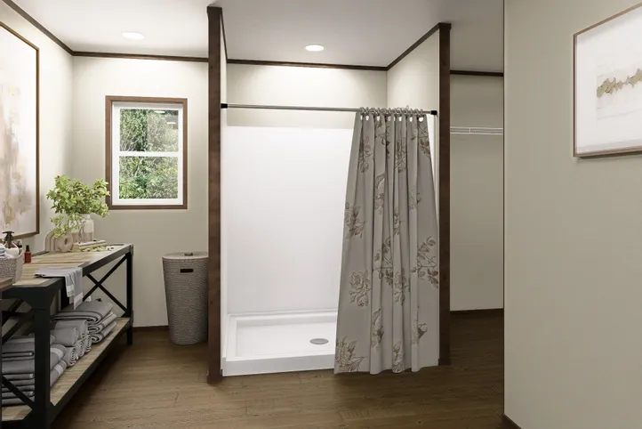 The EVEREST Primary Bathroom. This Manufactured Mobile Home features 4 bedrooms and 2 baths.