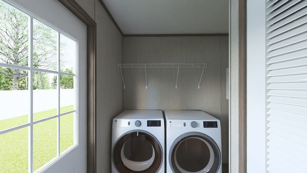 The LEGEND 28X48 Utility Room. This Manufactured Mobile Home features 3 bedrooms and 2 baths.