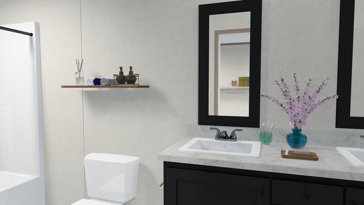 The 6016-4779 THE PULSE Primary Bathroom. This Manufactured Mobile Home features 2 bedrooms and 2 baths.