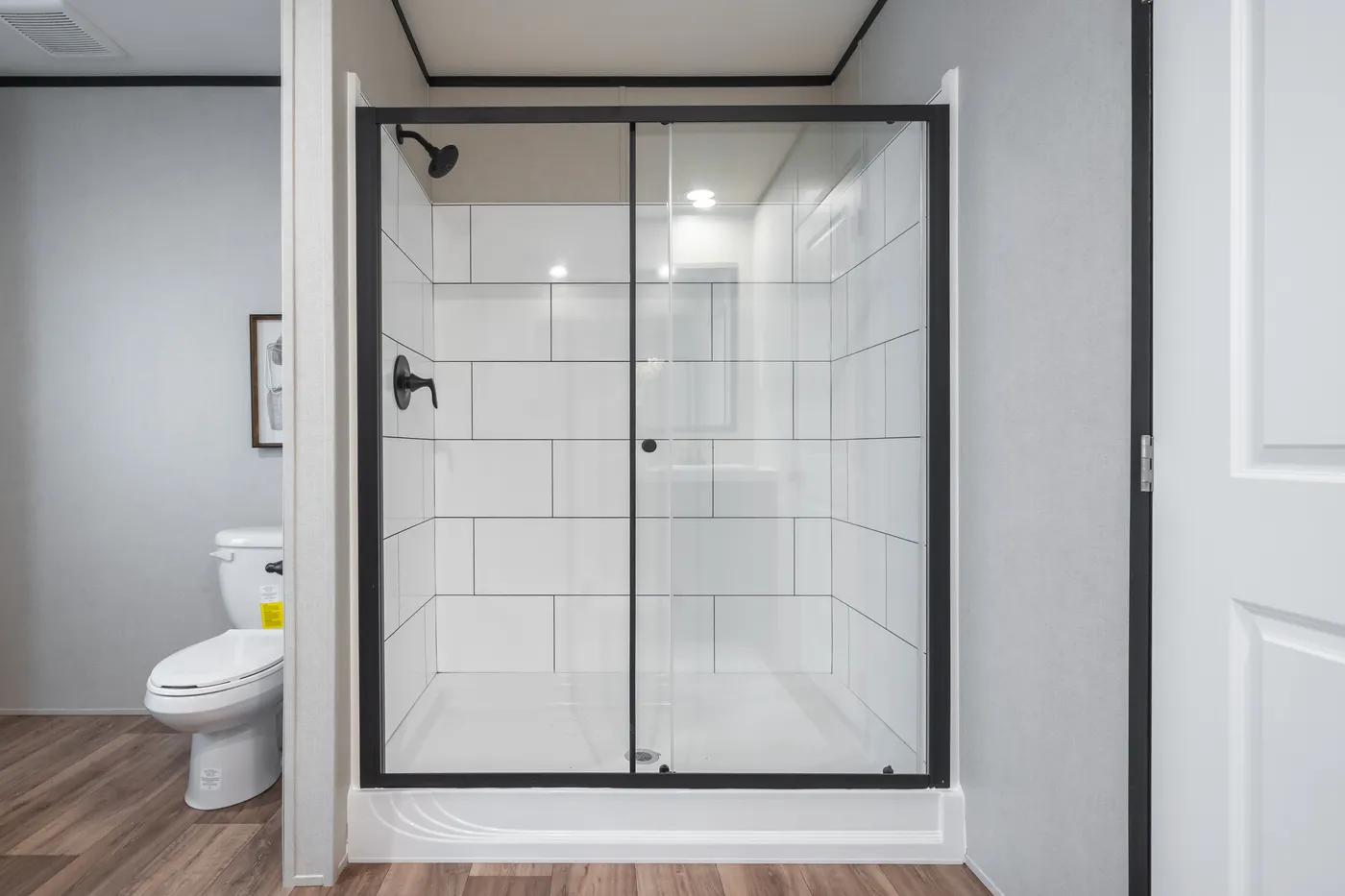 The ABSOLUTE VALUE Primary Bathroom. This Manufactured Mobile Home features 4 bedrooms and 2 baths.