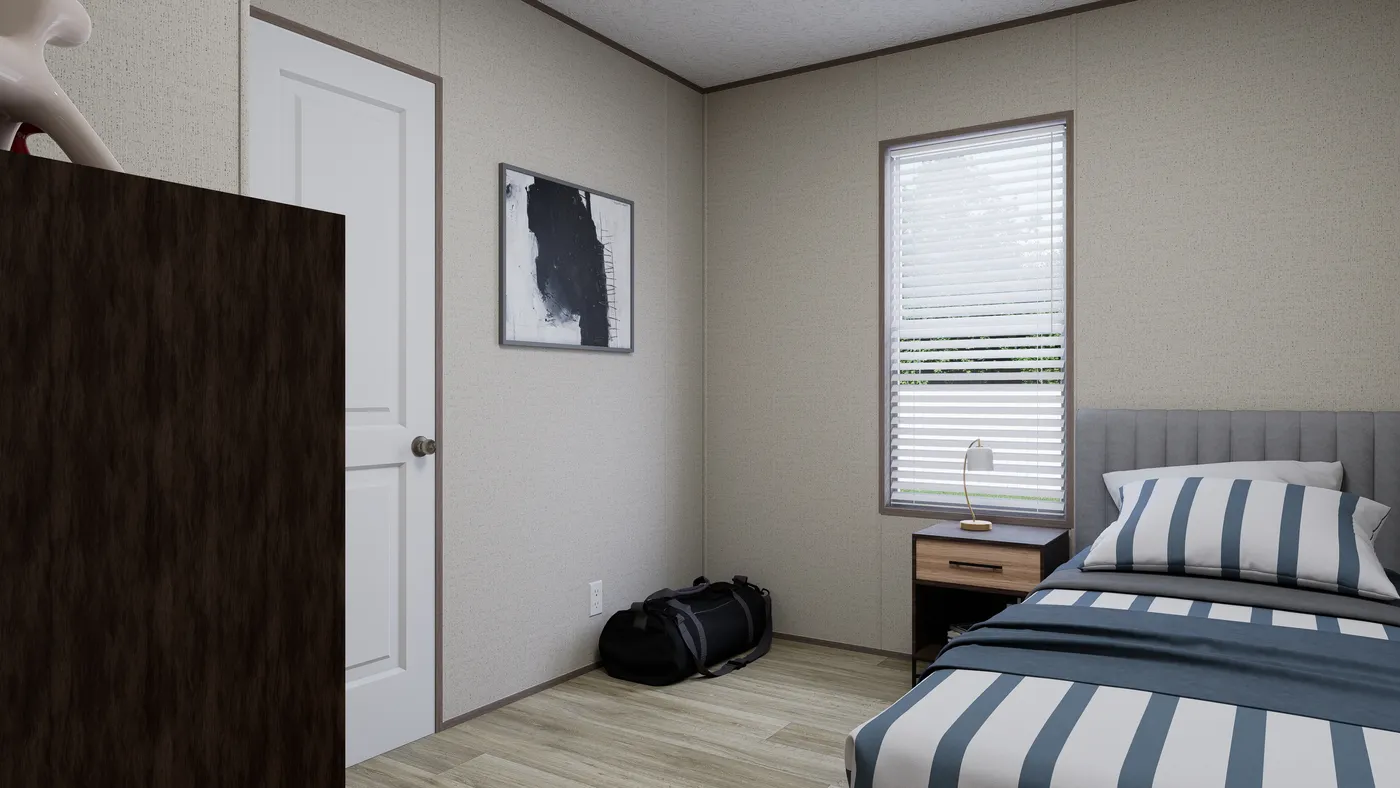 The ROCKY VALLEY Guest Bedroom. This Manufactured Mobile Home features 3 bedrooms and 2 baths.