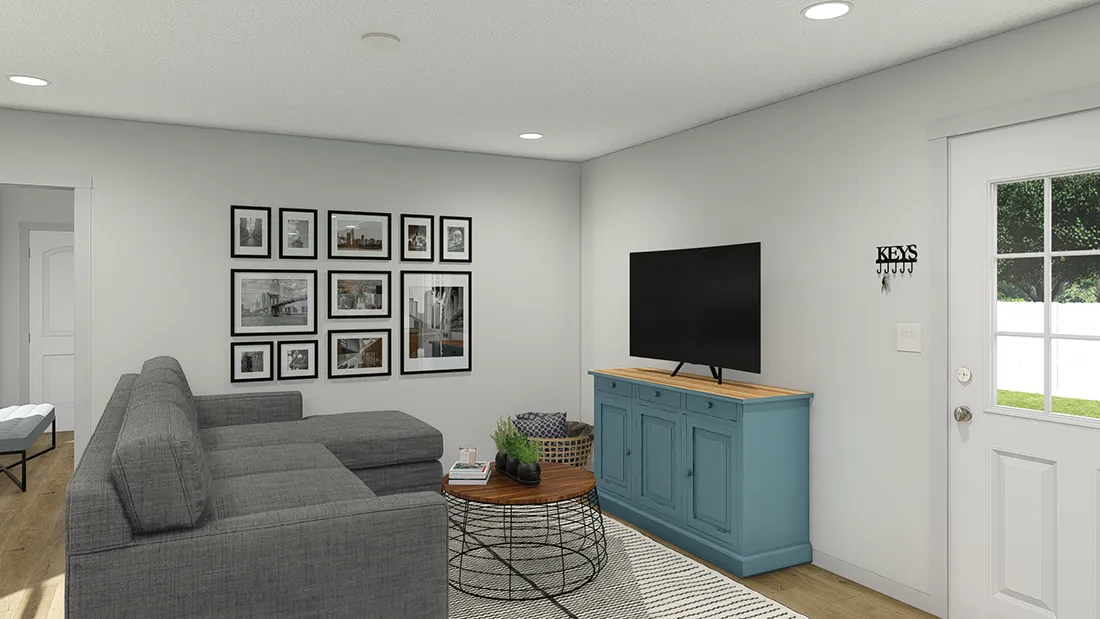 The SOLSBURY HILL 7616 TEMPO Living Room. This Manufactured Mobile Home features 3 bedrooms and 2 baths.
