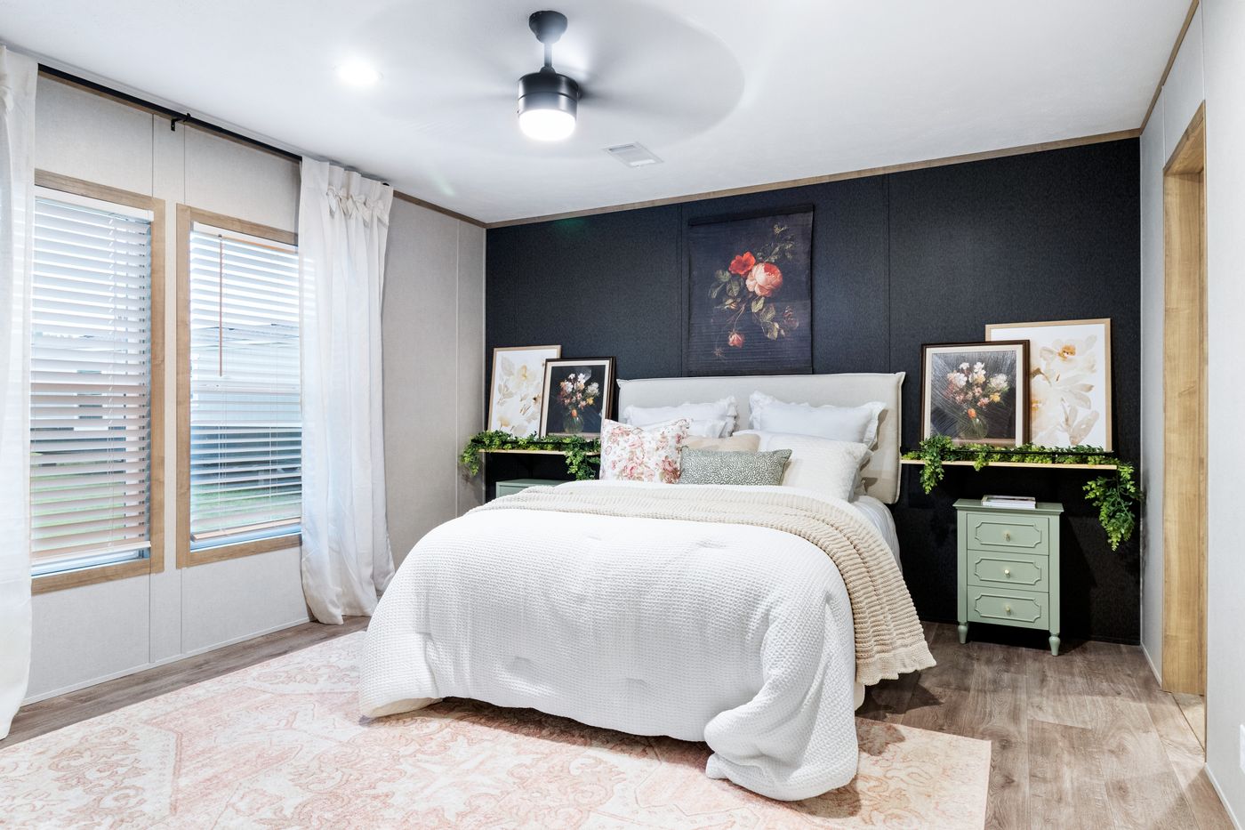 The EL SUENO BREEZE Primary Bedroom. This Manufactured Mobile Home features 4 bedrooms and 2 baths.