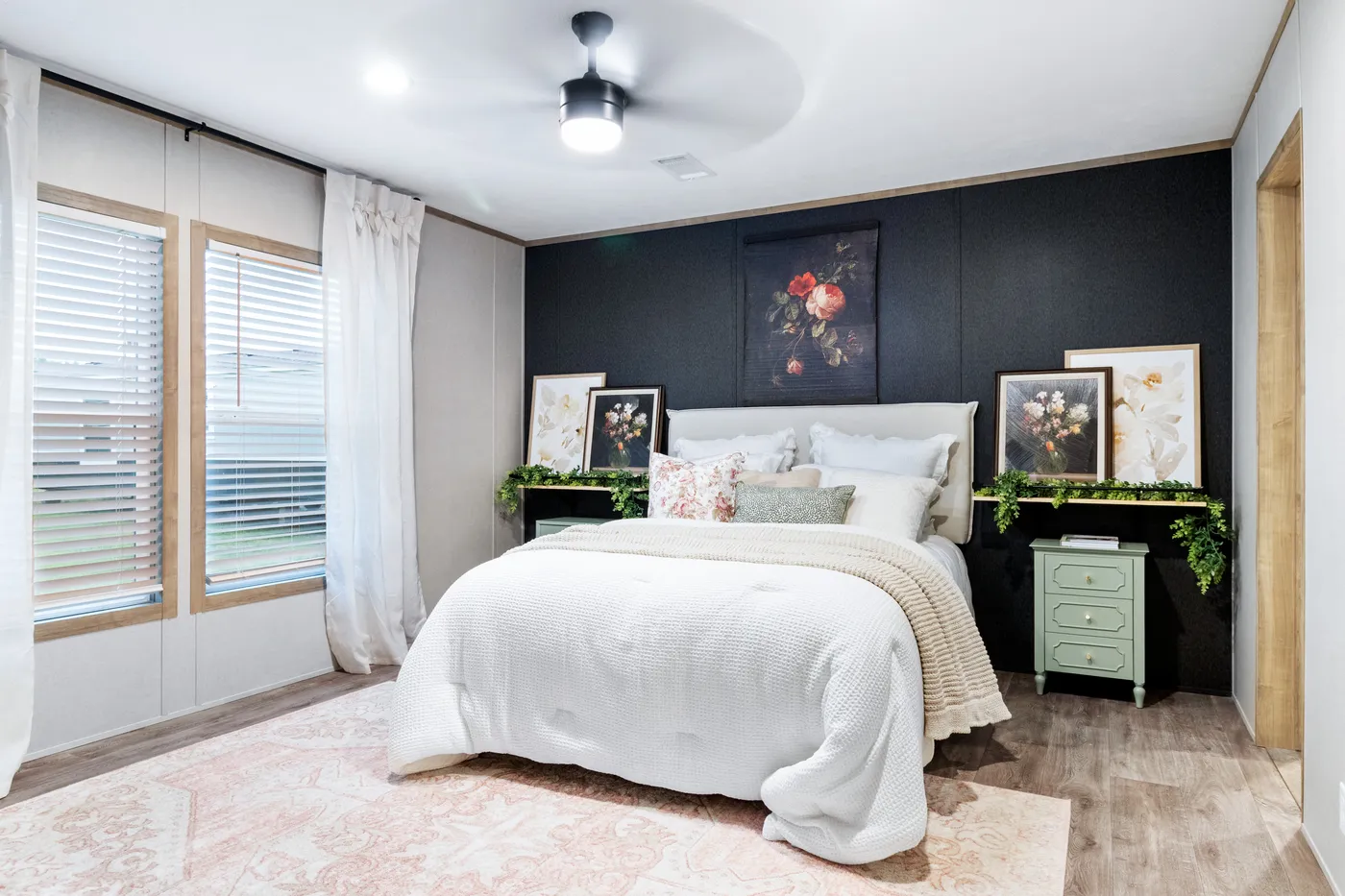The EL SUENO BREEZE Primary Bedroom. This Manufactured Mobile Home features 4 bedrooms and 2 baths.