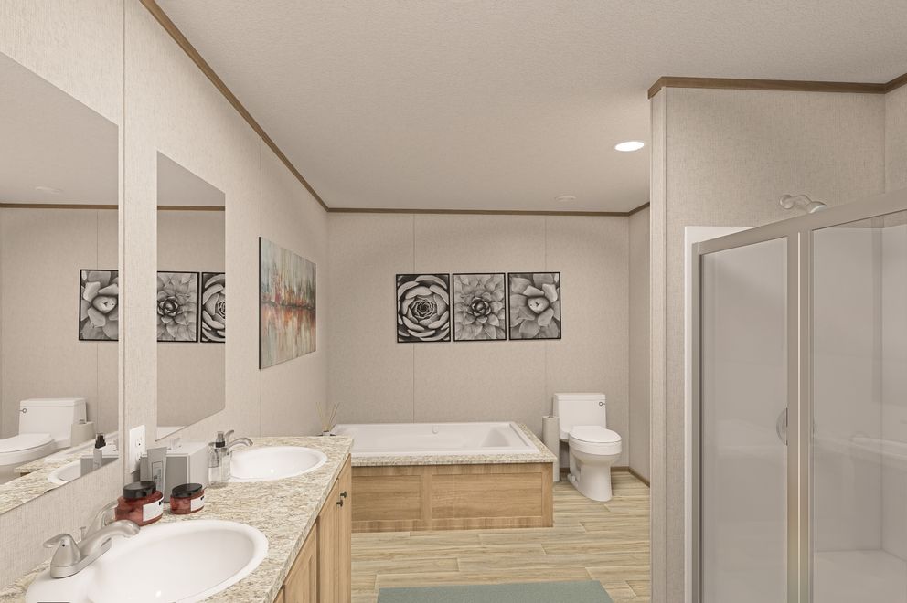 The THE EAGLE 52 Primary Bathroom. This Manufactured Mobile Home features 3 bedrooms and 2 baths.