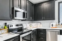 The THE ARMANI Kitchen. This Manufactured Mobile Home features 3 bedrooms and 2 baths.