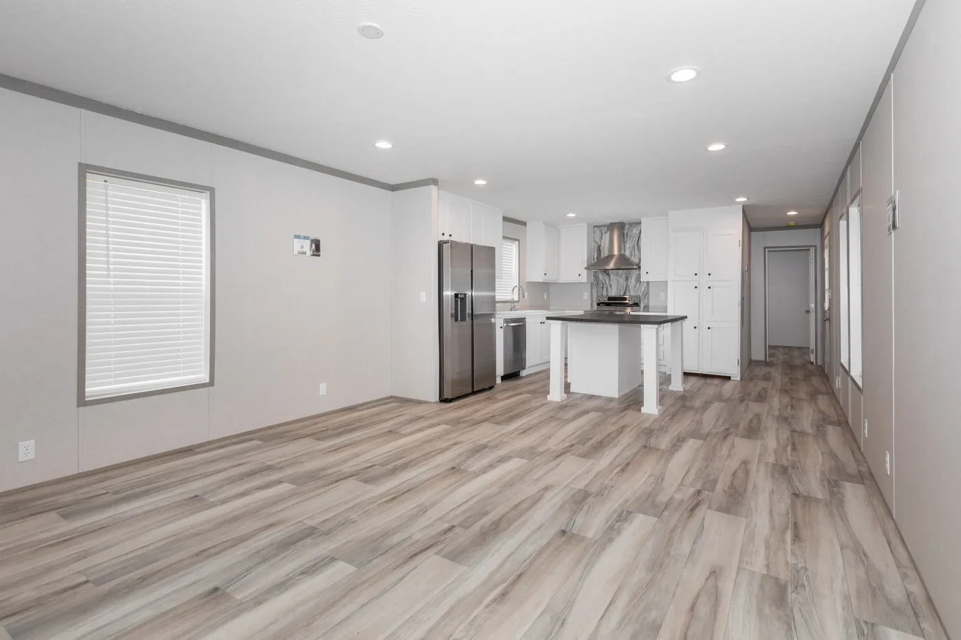 The THE PANTRY HOUSE Living Room. This Manufactured Mobile Home features 3 bedrooms and 2 baths.