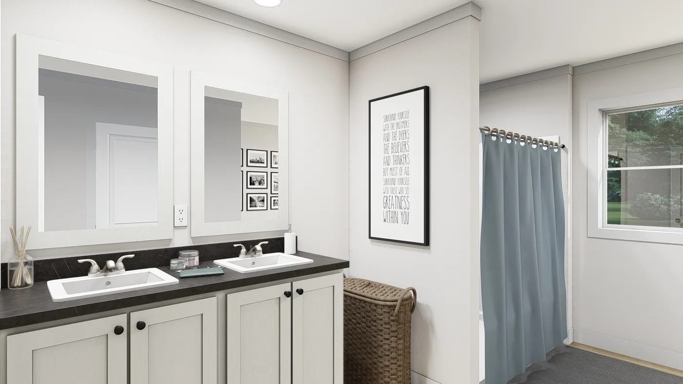 The LEAN ON ME Primary Bathroom. This Manufactured Mobile Home features 3 bedrooms and 2 baths.