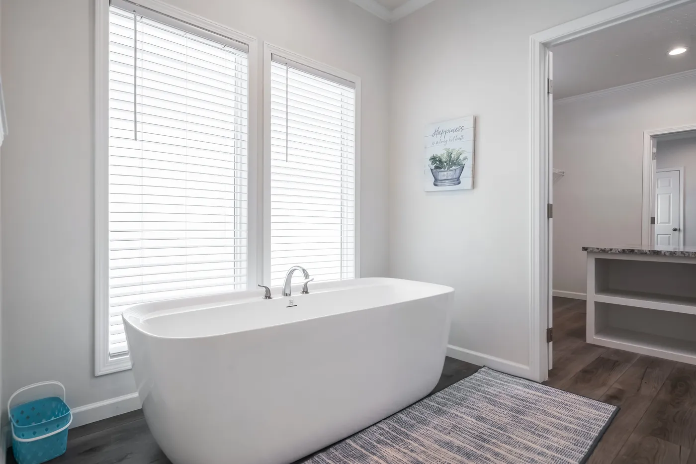 The 3458 MOD 76X32 CAROLINA RAELYN Primary Bathroom. This Modular Home features 4 bedrooms and 3 baths.