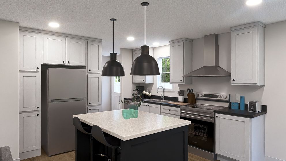 The RISING SUN Kitchen. This Manufactured Mobile Home features 2 bedrooms and 2 baths.