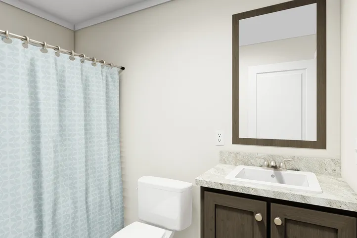 The RENEGADE 48A Guest Bathroom. This Manufactured Mobile Home features 3 bedrooms and 2 baths.