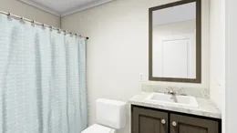 The RENEGADE 48A Guest Bathroom. This Manufactured Mobile Home features 3 bedrooms and 2 baths.