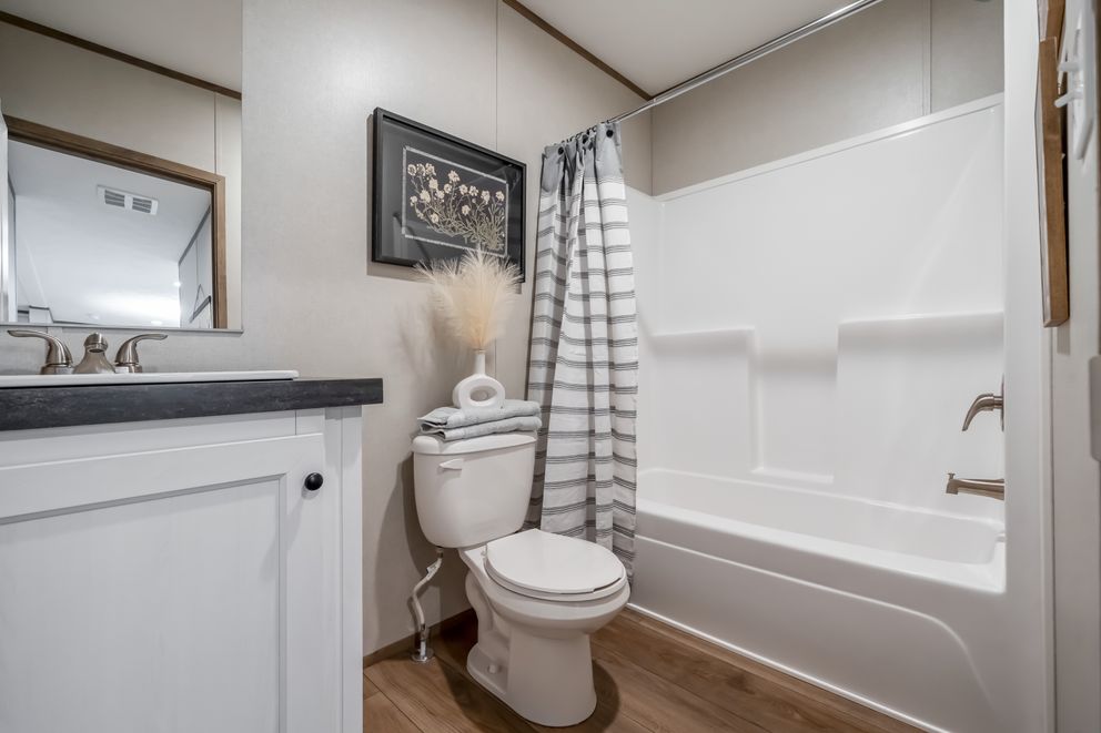 The VISTA Guest Bathroom. This Manufactured Mobile Home features 3 bedrooms and 2 baths.